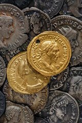 A treasure of Roman gold and silver coins.Trajan Decius. AD 249-251. AV Aureus.Ancient coin of the...
