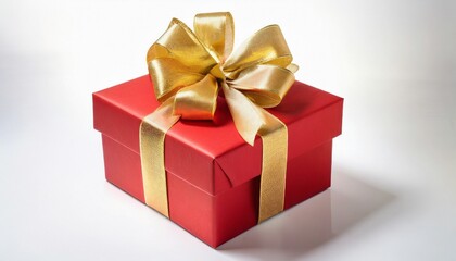 Red gift box wrapped with gold bow and ribbon isolated on white background.