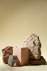 Decorative stone podiums on color background