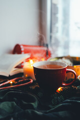 A cup of tea with smoke in a Christmas atmosphere, mood