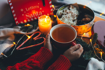 A cup of tea with smoke in a Christmas atmosphere, mood