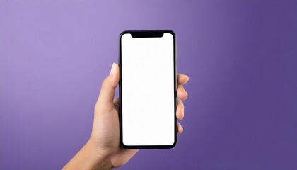 Hand using smartphone with blank screen, isolated on purple background