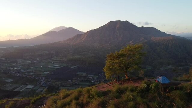 the footage in Pinggan Kintamani Bali and the Batur mountain view in sunrise with the sunshine