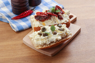 bruschetta with soft cheese capers and tomato