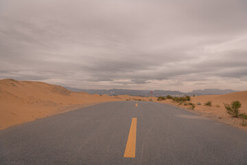 An empty highway going through the desert, Inner Mongolia, China