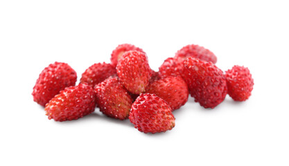 Ripe red wild strawberries isolated on white