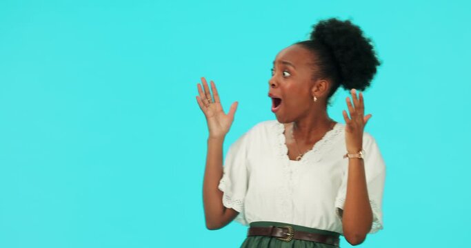 Wow, mockup and a mind blown black woman on a blue background in studio for surprise or shock. Portrait, omg or wtf expression with a young female person on space for advertising or marketing