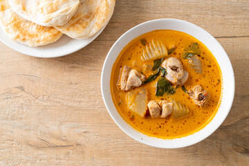 Chicken curry soup with roti