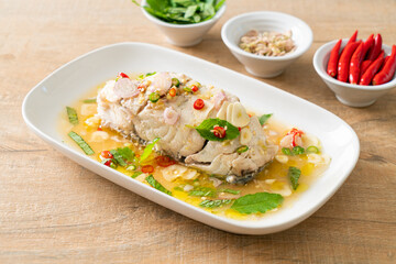 steamed sea bass fish with herbs