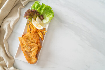 fish and chips - fried fish fillet with potatoes chips - obrazy, fototapety, plakaty