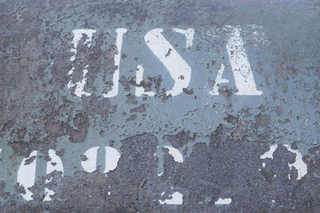 Old american panzer in Belgium after second world war. Text USA and number on grunge texture.