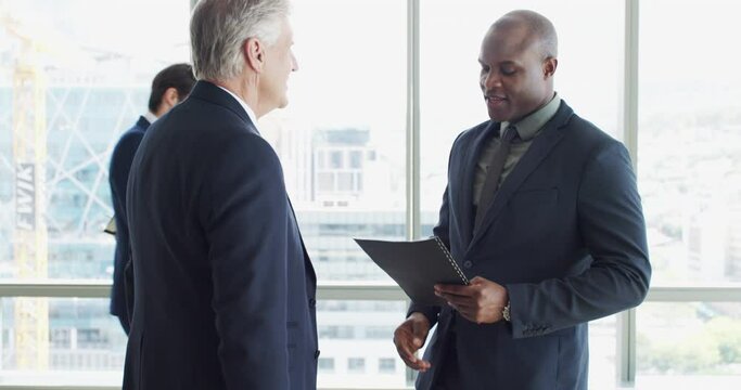 Business people, shaking hands and welcome to meeting, partnership and introduction for deal or law firm in lobby. Corporate men, lawyer or clients handshake with documents for advice and consulting