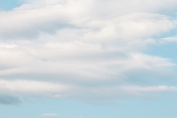 Background of blue sky with white clouds