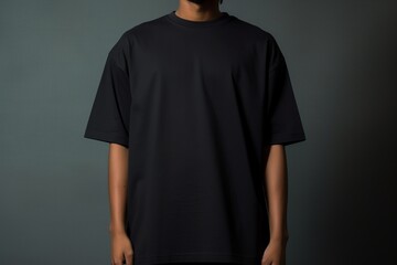 A pitch black T-shirt with a rectangular label box on the right side.