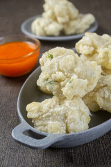 Cireng kuah seblak. indonesian food made from tapioca flour is given spices such as garlic, salt, pepper and is cooked by frying.