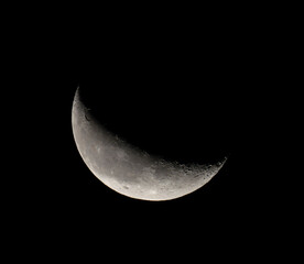 Obraz na płótnie Canvas close up on moon with dark background, waxing gibbous