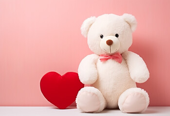 Teddy bear holding a heart-shaped pillow with plank