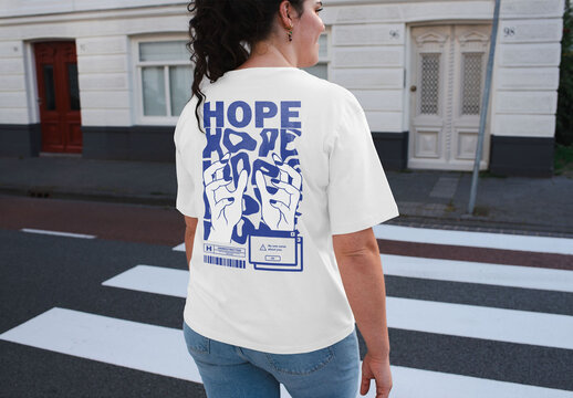 Mockup of woman wearing customizable t-shirt, rear view