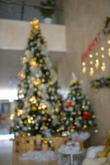 Royalty high quality free stock photo of abstract blur and defocused Christmas tree with a lot of decoration on cool tone