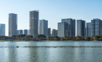 Fototapeta premium A modern city by the lake