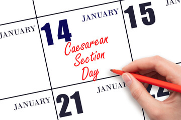 January 14. Hand writing text Caesarean Section Day on calendar date. Save the date.