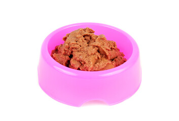 Purple plastic bowl with pate cat food isolated on white background.