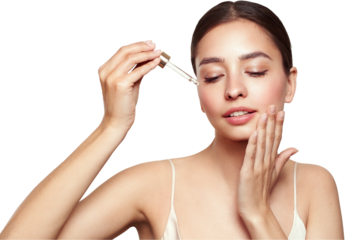 Young beautiful woman applying face serum with pipette. Cosmetic procedures for facial skin care