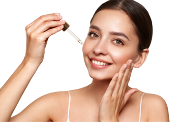 Young beautiful woman applying face serum with pipette. Cosmetic procedures for facial skin care