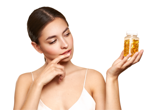 Vitamins. Close Up Of Happy Beautiful Girl With Pill With Cod Liver Oil Omega-3. Nutrition. Vitamin D, E, A Fish Oil Capsules. Healthy Lifestyle. Sport, Diet Concept