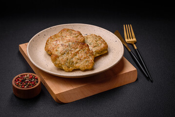 Delicious fresh fried minced fish cutlets with spices and herbs