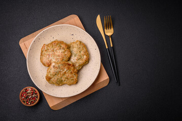 Delicious fresh fried minced fish cutlets with spices and herbs