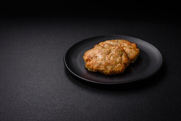 Delicious fresh fried minced fish cutlets with spices and herbs