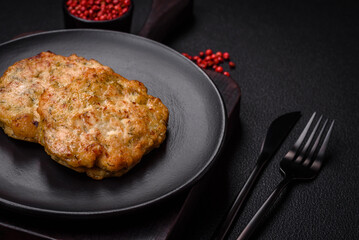 Delicious fresh fried minced fish cutlets with spices and herbs