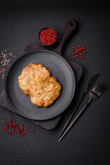 Delicious fresh fried minced fish cutlets with spices and herbs