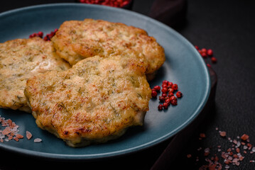 Delicious fresh fried minced fish cutlets with spices and herbs