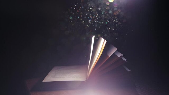 A ray of light falling on an old open book