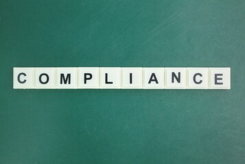 letters of the alphabet with the word compliance. compliance concept. industrial or legal concepts
