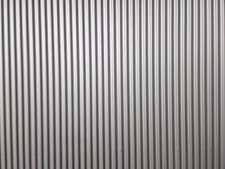 building is lined with square panels. metal sheet wall cladding with scalloped design. corrugated sheet, dark gray, riveted. horizontal stripes, shadows, corner, fence, aluminium, sheet - obrazy, fototapety, plakaty