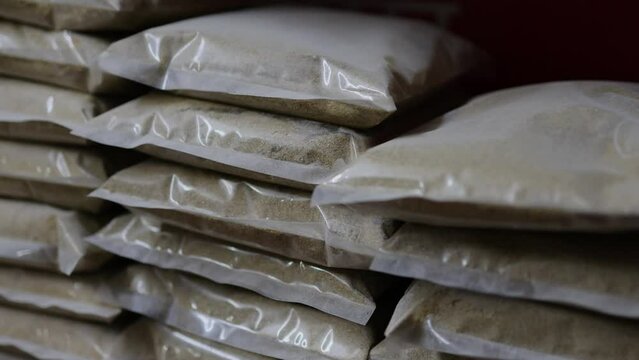 coriander seeds powder spice for sale at retail shop from top angle at day