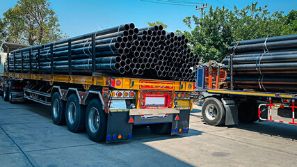Steel pipes are placed in factory, steel pipe for fabrication,Stacked together of steel tube, close-up.steel pipes in  in warehouses awaiting delivery.at thailand