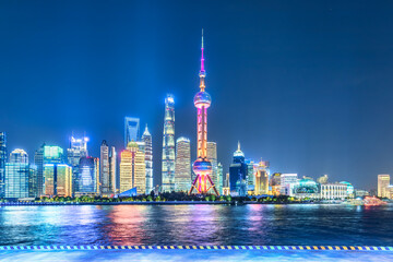 Shanghai city center skyline panorama at night in China