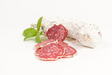 Salami sliced on the white background