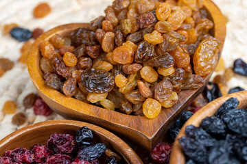 dried golden-colored raisins on the table