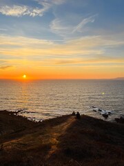 Ocean and purple sky at the ocean bay, orange ocean horizon