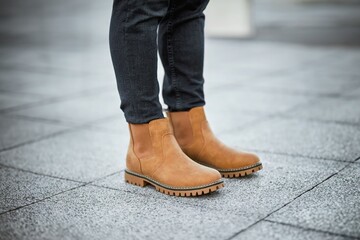 Suede winter shoes for men. Walking the City Streets in Comfort and Style with Modern Suede Leather Boots. Brown Boots.