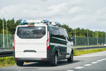 Traffic control van on the highway. Mobile radar speed safety camera unit parked at the side of a...