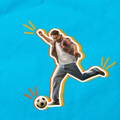 Excited and emotional young man in casual clothes hitting ball, playing football over blue background. Concept of sport, betting, winning, game, finances, good luck, hobby