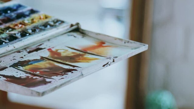 An artist at work in his studio