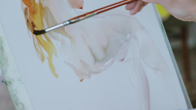 An artist at work in her studio