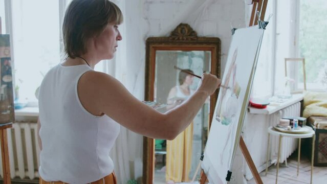 An artist at work in his studio